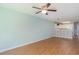 View of a living room leading into the kitchen and a view of the ceiling fan at 1125 Blue Stem Dr. # 29F, Pawleys Island, SC 29585