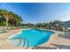 Beautiful community pool with lounge chairs and tables, great for swimming and relaxation at 1125 Blue Stem Dr. # 29F, Pawleys Island, SC 29585