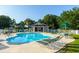 Community pool with plenty of lounge chairs provides an ideal spot for relaxation at 1125 Blue Stem Dr. # 29F, Pawleys Island, SC 29585