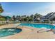 Community pool and hot tub with outdoor seating, perfect for relaxing by the water at 1125 Blue Stem Dr. # 29F, Pawleys Island, SC 29585