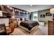 Bedroom with a large window, statement wall mural, and stylish furniture, perfect for relaxing at 115 Northbrook Dr, Murrells Inlet, SC 29576