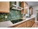 Contemporary kitchen highlighting sleek countertops, modern backsplash, and high-end appliances for a chef-inspired design at 115 Northbrook Dr, Murrells Inlet, SC 29576
