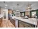 Spacious kitchen with a large island, stainless steel appliances, and open layout ideal for cooking and socializing at 115 Northbrook Dr, Murrells Inlet, SC 29576