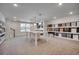 Showroom with an island and carpeted floors, featuring various material samples and design options at 115 Northbrook Dr, Murrells Inlet, SC 29576