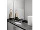 Close-up of bathroom sink with granite countertop and modern fixtures at 116 Sago Palm Dr., Myrtle Beach, SC 29579