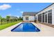 Enjoy the private swimming pool in the backyard with its perfectly manicured lawn at 116 Sago Palm Dr., Myrtle Beach, SC 29579