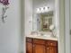 Bathroom showcasing a vanity with sink, updated fixtures, and a bright vanity light at 118 Birch N Coppice Dr. # 6, Surfside Beach, SC 29575