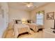 Twin bedroom featuring two twin beds with neutral decor and a ceiling fan at 118 Birch N Coppice Dr. # 6, Surfside Beach, SC 29575