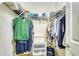 Organized walk-in closet with ample storage space and shelving for clothes and accessories at 118 Birch N Coppice Dr. # 6, Surfside Beach, SC 29575