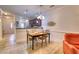 Cozy dining area featuring a table set for four, connecting the living space with the well-equipped kitchen at 118 Birch N Coppice Dr. # 6, Surfside Beach, SC 29575