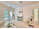 Bright living room features french doors, neutral decor, and comfortable seating for a relaxing atmosphere at 118 Birch N Coppice Dr. # 6, Surfside Beach, SC 29575