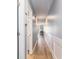 Hallway featuring beautiful, light colored wood floors and stylish beach themed decor at 1210 N Ocean Blvd. # 104, Surfside Beach, SC 29575