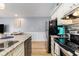 Modern kitchen featuring granite countertops, stainless steel appliances, and an open layout at 1210 N Ocean Blvd. # 104, Surfside Beach, SC 29575