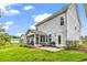 Spacious backyard featuring patio, screened in porch and fenced yard at 1216 Newell Dr, Myrtle Beach, SC 29588