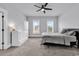 A well-lit bedroom featuring carpet floors, ceiling fan, and a neutral color palette at 1216 Newell Dr, Myrtle Beach, SC 29588