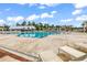 Enjoy the community's large swimming pool with lounge chairs, pergolas and shade at 1216 Newell Dr, Myrtle Beach, SC 29588