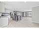 Open concept living and kitchen area, stainless steel appliances, with island and lots of light, great for entertaining at 1301 Rabbit Ln., Conway, SC 29526