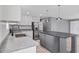 Contemporary kitchen with white cabinets, stainless steel appliances, grey countertops, and a central island at 1301 Rabbit Ln., Conway, SC 29526