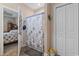Bathroom with shower featuring a starfish curtain and tile floors at 144 Baylee Circle, Aynor, SC 29544