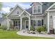 Attractive home showcasing a manicured front yard, tasteful landscaping, and a welcoming entrance, enhanced by decorative touches at 144 Baylee Circle, Aynor, SC 29544