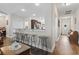 View of the kitchen and breakfast bar leading to the front door and a view of the dining room at 144 Baylee Circle, Aynor, SC 29544