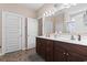Primary bathroom featuring double sink vanity, and tile floors at 144 Baylee Circle, Aynor, SC 29544