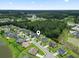 Aerial view of neighborhood homes, featuring a park and community spaces at 1448 Tiger Grand Dr., Conway, SC 29526