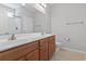 Bathroom offers dual sinks with cabinets and a separate toilet and shower area at 1448 Tiger Grand Dr., Conway, SC 29526