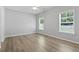 Bedroom with two windows allowing for natural light to brighten the space at 1448 Tiger Grand Dr., Conway, SC 29526