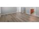 Bright bedroom features luxury vinyl plank flooring and ensuite bathroom at 1448 Tiger Grand Dr., Conway, SC 29526