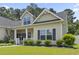 Charming single-Gathering home with inviting front porch and manicured landscaping at 1448 Tiger Grand Dr., Conway, SC 29526