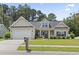 Inviting single-Gathering home with a two-car garage and manicured lawn at 1448 Tiger Grand Dr., Conway, SC 29526