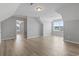 Open-concept living area with light walls, recessed lighting, and wood-look floors at 1448 Tiger Grand Dr., Conway, SC 29526