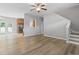 Open-concept living area with tile floor transition into the kitchen at 1448 Tiger Grand Dr., Conway, SC 29526