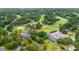 Aerial view of clubhouse and golf course, showcasing a great venue for recreation at 149 Old Cedar Loop, Pawleys Island, SC 29585