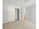 Neutral bedroom featuring carpet and an open closet at 149 Old Cedar Loop, Pawleys Island, SC 29585