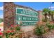Litchfield Country Club sign with flowerbeds, offering an inviting welcome to residents and guests at 149 Old Cedar Loop, Pawleys Island, SC 29585