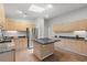 Well-equipped kitchen features custom cabinets, granite countertops, stainless steel appliances, and an island at 149 Old Cedar Loop, Pawleys Island, SC 29585