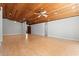 Bright, spacious living room with light wood floors, a wood ceiling, and an open doorway at 149 Old Cedar Loop, Pawleys Island, SC 29585