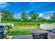 Backyard featuring a patio with outdoor seating and a view of the trees and water at 153 Goldenrod Circle # 7D, Little River, SC 29566