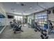 The gym offers modern workout equipment with glass doors providing a view of the outdoors at 153 Goldenrod Circle # 7D, Little River, SC 29566