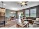 Bright living area with a dining table, sliding glass doors, and comfortable seating at 153 Goldenrod Circle # 7D, Little River, SC 29566