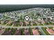 Aerial view of a charming home in a quiet community, near the lake and forest at 165 Northside Dr., Little River, SC 29566
