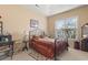 Well-lit bedroom with a trey ceiling and elegant decor, creating a comfortable space at 165 Northside Dr., Little River, SC 29566