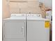 Laundry room features a white washer and dryer at 1654 Low Country Pl. # C, Myrtle Beach, SC 29577