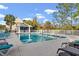 Community pool with a bar and outdoor seating, surrounded by mature trees at 1654 Low Country Pl. # C, Myrtle Beach, SC 29577