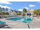 A community pool includes a bar and several lounge chairs at 1654 Low Country Pl. # C, Myrtle Beach, SC 29577