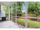 Cozy screened porch offering a private outdoor space with views of the backyard at 1654 Low Country Pl. # C, Myrtle Beach, SC 29577