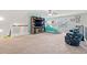 Large bedroom featuring a TV, sitting area, and carpet flooring at 1715 Lake Egret Dr., North Myrtle Beach, SC 29582