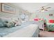 Charming bedroom featuring two twin beds, sea-themed decor, and natural light at 1715 Lake Egret Dr., North Myrtle Beach, SC 29582